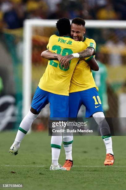 Neymar Jr. Of Brazil celebrates after scoring the first goal of his team with teammate Vinícius Júnior of Brazil during a match between Brazil and...