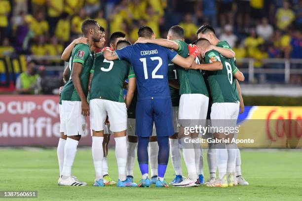 Players of Bolivia huddle prior to a match between Colombia and Bolivia as part of FIFA World Cup Qatar 2022 Qualifier on March 24, 2022 in...