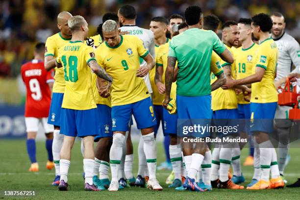 Richarlison of Brazil celebrates with teammates after winning a match between Brazil and Chile as part of FIFA World Cup Qatar 2022 Qualifier on...