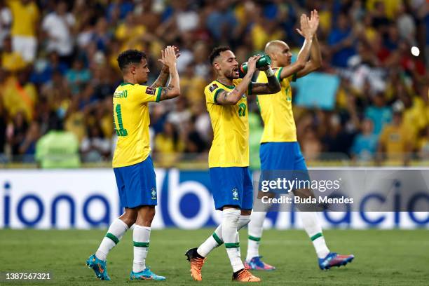 Philippe Coutinho and Neymar Jr. Of Brazil celebrate after winning a match between Brazil and Chile as part of FIFA World Cup Qatar 2022 Qualifier on...