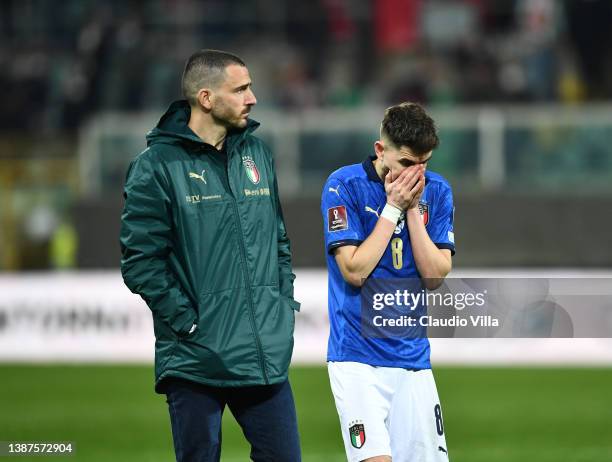 Leonardo Bonucci and Jorginho of Italy dejected during the 2022 FIFA World Cup Qualifier knockout round play-off match between Italy and North...