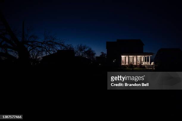 Home is seen amongst a power outage in the Arabi neighborhood on March 24, 2022 in New Orleans, Louisiana. Two tornados struck New Orleans on...