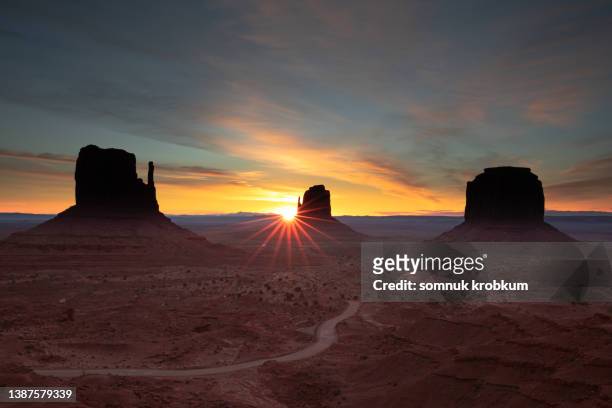 monument valley in sun rise time - canyon stock pictures, royalty-free photos & images