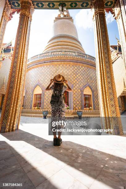 vertical adventure latin beautiful tourist women travel in the buddha temple - grand palace bangkok stock pictures, royalty-free photos & images