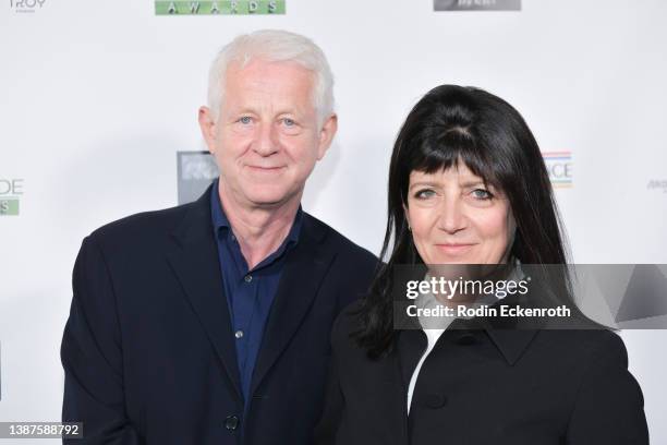 Richard Curtis and Emma Freud attends the US-Ireland Alliance's 16th annual Oscar Wilde Awards at The Ebell Club of Los Angeles on March 24, 2022 in...
