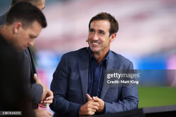 Andrew Johns is seen as he prepares for the pre-match commentary before the round three NRL match between the South Sydney Rabbitohs and the Sydney...