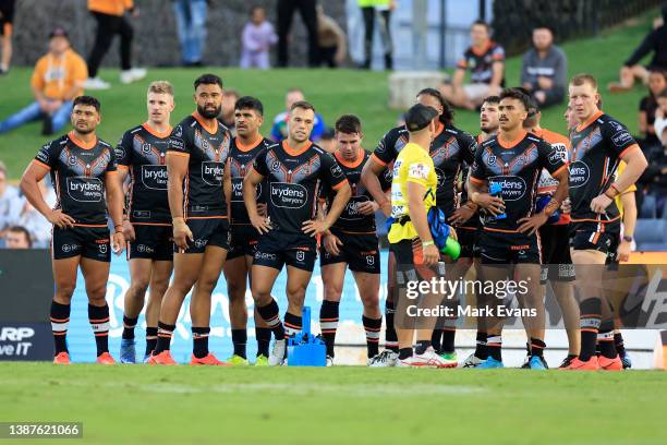 The Tigers look on after conceding a try during the round three NRL match between the Wests Tigers and the New Zealand Warriors at Campbelltown...