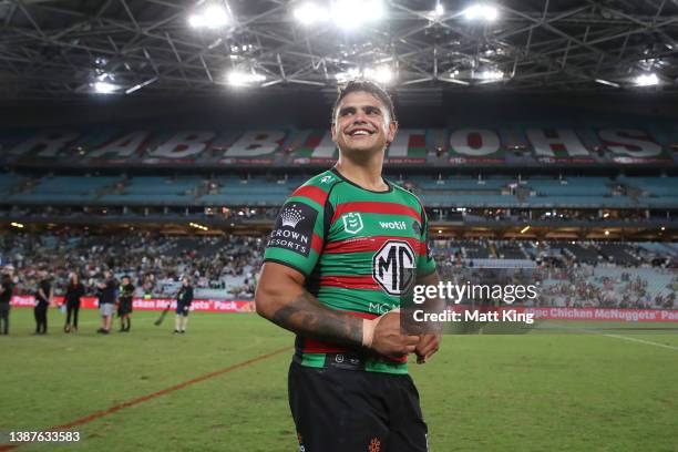 Latrell Mitchell of the Rabbitohs smiles to the crowd as he celebrates victory in the round three NRL match between the South Sydney Rabbitohs and...