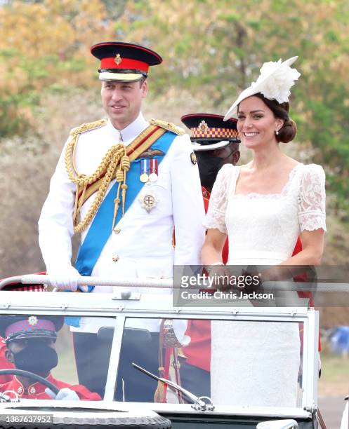 Prince William, Duke of Cambridge and Catherine, Duchess of Cambridge smile as they attend the inaugural Commissioning Parade for service personnel...