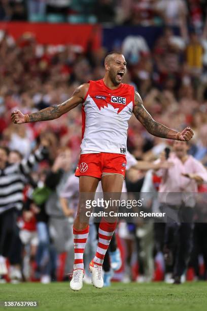 Lance Franklin of the Swans celebrates kicking his 1000th AFL goal during the round two AFL match between the Sydney Swans and the Geelong Cats at...