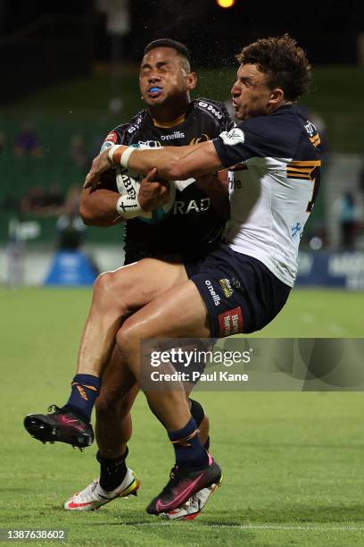 Toni Pulu of the Force gets tackled by Tom Banks of the Brumbies while running in for try during the round six Super Rugby Pacific match between the...