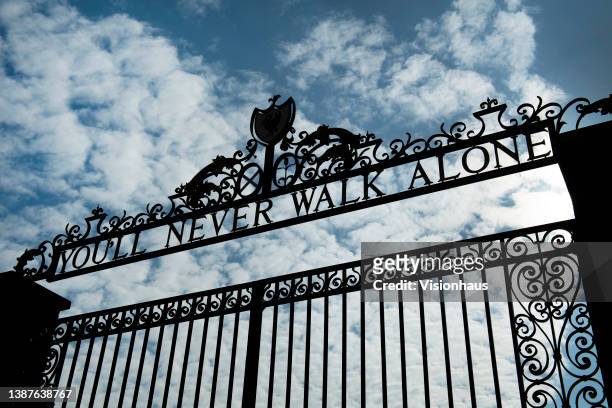 The Shankly Gates displaying the slogan 'You'll Never Walk Alone' outside Anfield Stadium, home of Liverpool FC on March 24, 2022 in Liverpool,...