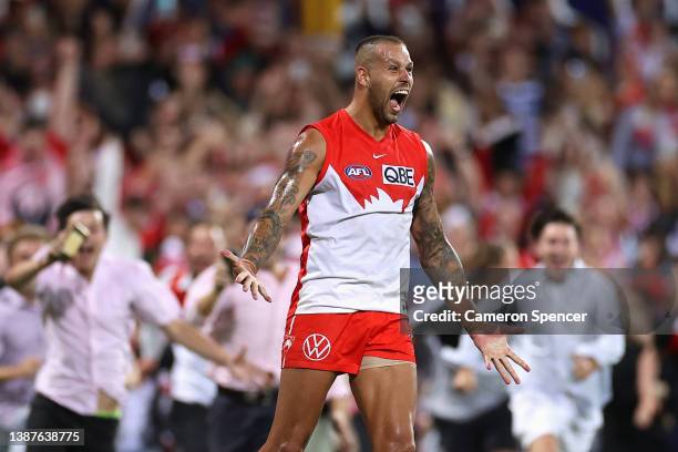 Lance Franklin of the Swans celebrates kicking his 1000th AFL goal during the round two AFL match between the Sydney Swans and the Geelong Cats at...