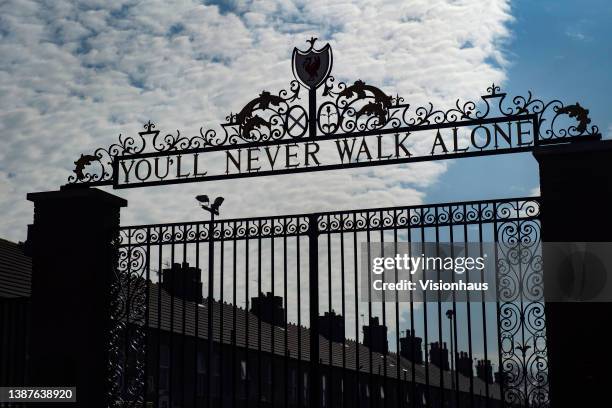 The Shankly Gates displaying the slogan 'You'll Never Walk Alone' outside Anfield Stadium, home of Liverpool FC on March 24, 2022 in Liverpool,...