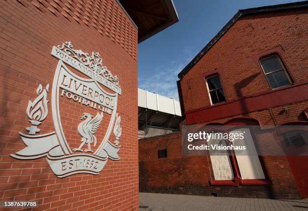 The Liverpool FC club crest on a wall outside the Anfield Stadium, home of Liverpool FC on March 24, 2022 in Liverpool, England.