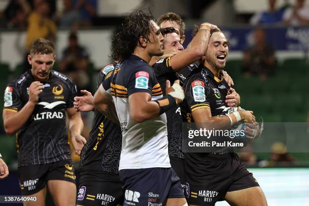 Jake Strachan of the Force celebrates crossing for a try during the round six Super Rugby Pacific match between the Western Force and the ACT...
