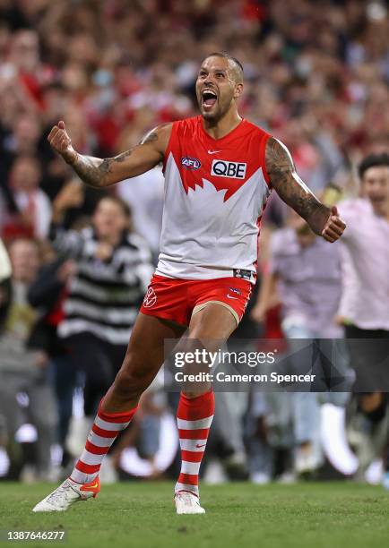 Lance Franklin of the Swans celebrates kicking his 1000th AFL goal during the round two AFL match between the Sydney Swans and the Geelong Cats at...