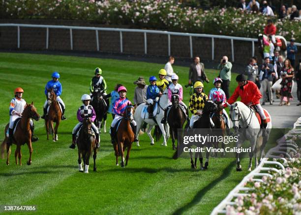 The field for the Pony race head out to the start during William Reid Stakes Night at Moonee Valley Racecourse on March 25, 2022 in Melbourne,...