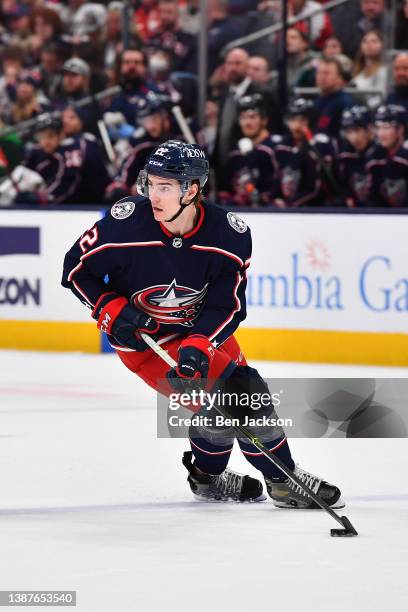 Jake Bean of the Columbus Blue Jackets skates with the puck during the second period of a game against the St. Louis Blues at Nationwide Arena on...