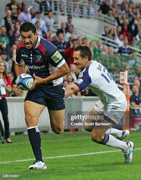 Mark Gerrard of the Rebels scores a try during the Super Rugby trial match between the Melbourne Rebels and the Auckland Blues at AAMI Park on...