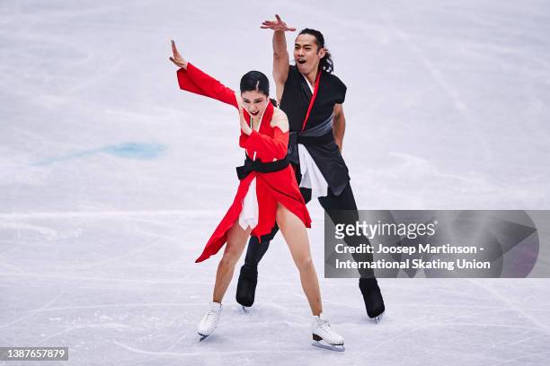 Kana Muramoto and Daisuke Takahashi compete in the Ice Dance Rhythm Dance during day 3 of the ISU World Figure Skating Championships at Sud de France...
