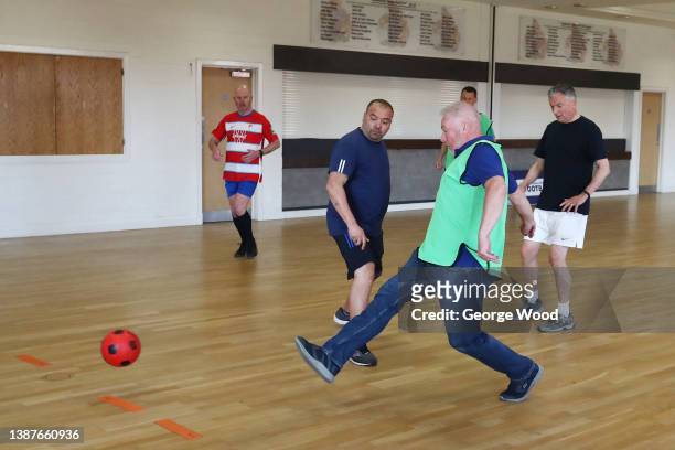 The National Lottery Football Weekends Ambassador, Ally McCoist plays walking football as he visits Altrincham FC to see how National Lottery...