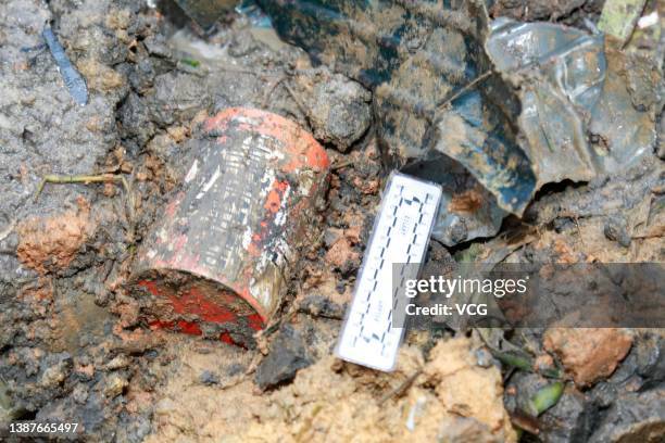 Rescuers find a black box, which was preliminarily identified as the cockpit voice recorder from the crashed China Eastern Airlines Flight MU5735, at...