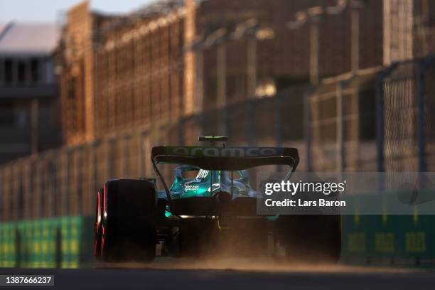 Nico Hulkenberg of Germany driving the Aston Martin AMR22 Mercedes kicks up dust during practice ahead of the F1 Grand Prix of Saudi Arabia at the...