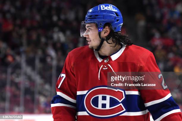Alexander Romanov of the Montreal Canadiens stands on the ice during the game against the Ottawa Senators in the NHL game at the Bell Centre on March...