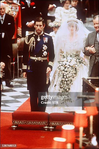 Picture of Lady Diana, Princess of Wales with Prince Charles of Wales at their wedding at St Paul Cathedral in London in this file photo dated 29...