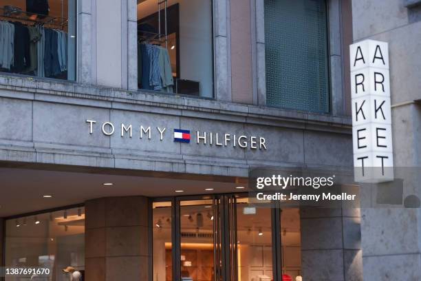 The exterior of a Tommy Hilfiger & an Arket store photographed on March 22, 2022 in Munich, Germany.