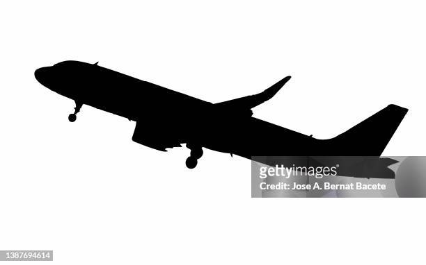 vector illustration of silhouette of an airplane taking off on a white background. - low flying aircraft stockfoto's en -beelden