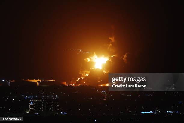 An Aramco oil depot close to the circuit is seen in flames following an incident during practice ahead of the F1 Grand Prix of Saudi Arabia at the...