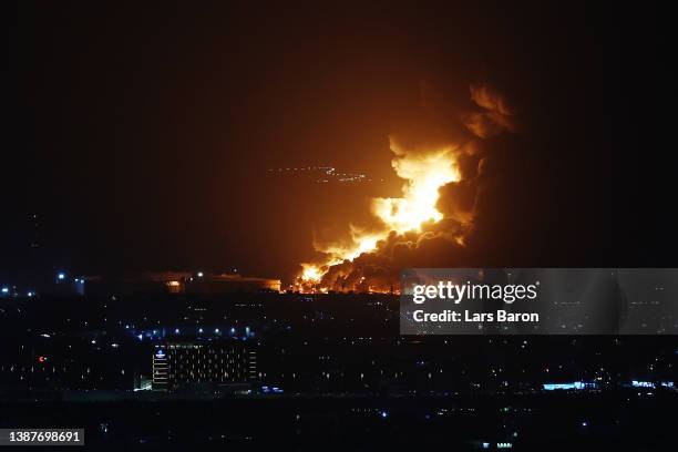 An Aramco oil depot close to the circuit is seen in flames following an incident during practice ahead of the F1 Grand Prix of Saudi Arabia at the...