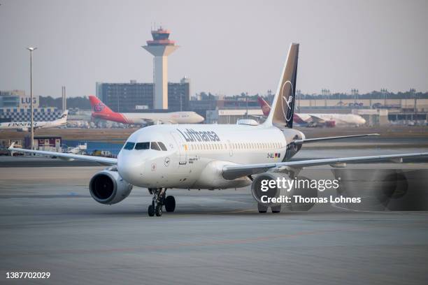 Ukrainian refugees arrive with a Lufthansa airplane at Frankfurt Airport on March 25, 2022 in Frankfurt, Germany. They arrived with the first plane...