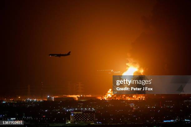 An Aramco oil depot close to the circuit is seen in flames following an incident during practice ahead of the F1 Grand Prix of Saudi Arabia at the...