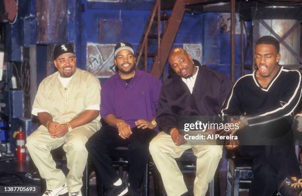 Rappers Mack 10 , Ice Cube and WC of Westside Connection meet Host Bill Bellamy when they visit "Yo! MTV Raps" on November 28, 1996 in New York City.