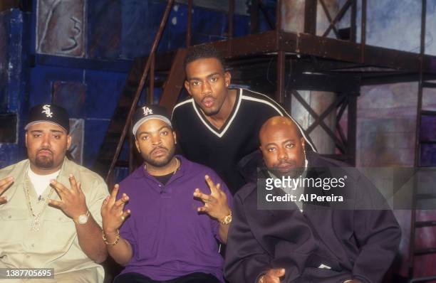 Rappers Mack 10 , Ice Cube and WC of Westside Connection meet Host Bill Bellamy when they visit "Yo! MTV Raps" on November 28, 1996 in New York City.