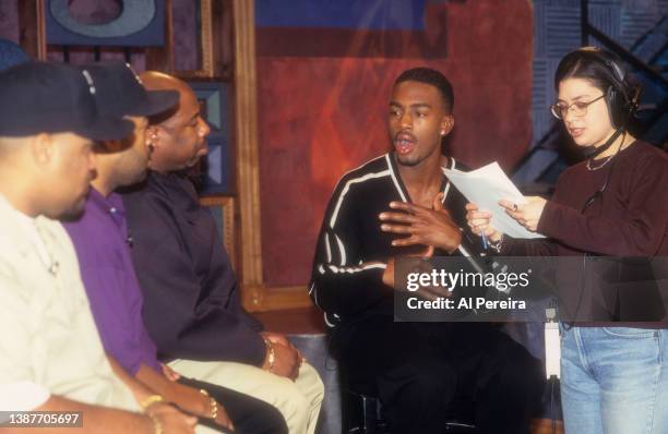 Rappers Mack 10 , Ice Cube and WC of Westside Connection meet Host Bill Bellamy when they visit "Yo! MTV Raps" on November 28, 1996 in New York City.