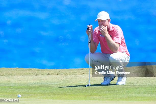 Vaughn Taylor of the United States lines up a putt on the 18th green during the second round of the Corales Puntacana Championship at the Corales...