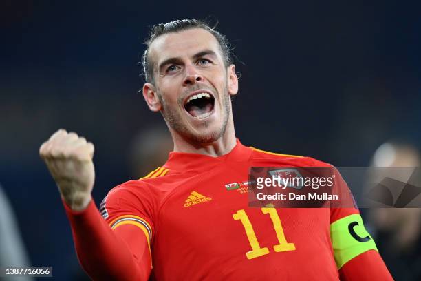 Gareth Bale of Wales celebrates following the 2022 FIFA World Cup Qualifier knockout round play-off match between Wales and Austria at Cardiff City...
