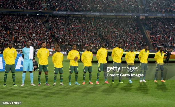 The Senegal team lines up ahead of the FIFA World Cup Qatar 2022 qualification match between Egypt and Senegal at Cairo International Stadium on...