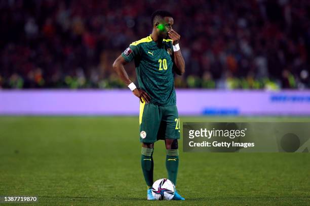 Bouna Sarr of Senegal stands dejected during the FIFA World Cup Qatar 2022 qualification match between Egypt and Senegal at Cairo International...