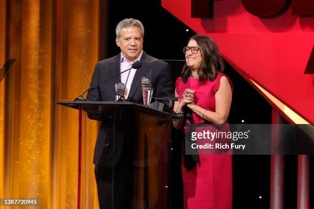 Michael De Luca and Pamela Abdy speak onstage at the 59th Annual ICG Publicists Awards luncheon at The Beverly Hilton on March 25, 2022 in Beverly...