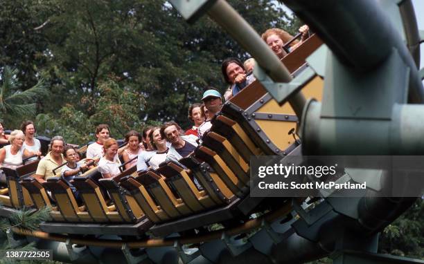 View of park-goers on the 'Runaway Train' roller coaster at Six Flags Great Adventure, Jackson, New Jersey, July 1981.