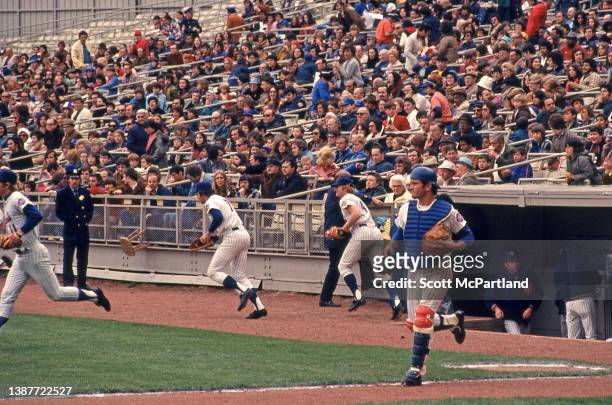 Members of the New York Mets take the field at Shea Stadium, in the Corona neighborhood of Queens, New York, New York, May 5, 1973. Among those...