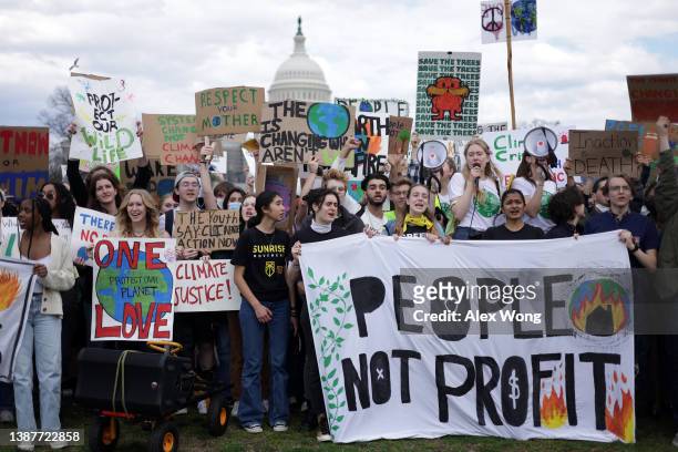 Environmental activists rally on Capitol Hill after a march from Lafayette Square during a Fridays Global Climate Strike event on March 25, 2022 in...