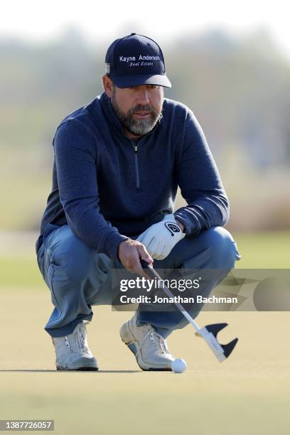 Eric Compton studies a putt on the third green during the second round of the Lake Charles Championship at Country Club at Golden Nugget on March 25,...