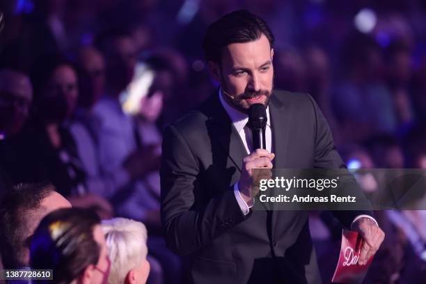 Jan Koeppen is seen on stage during the 5th show of the 15th season of the television competition show "Let's Dance" at MMC Studios on March 25, 2022...