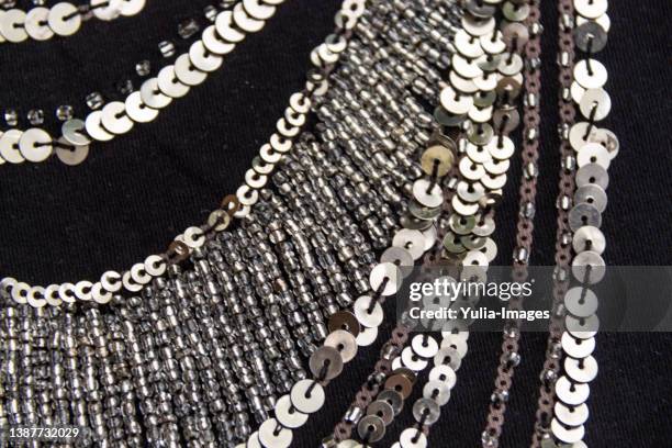 black glitter background textil - choker necklace foto e immagini stock